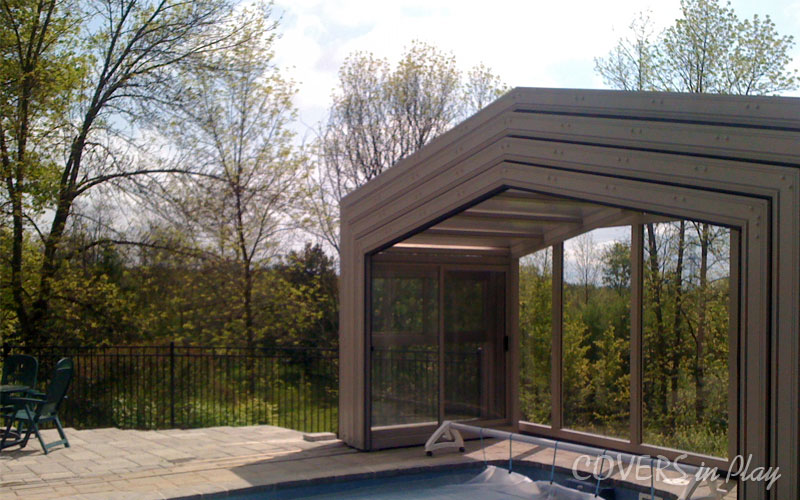Exterior view of closed pool dome in Milton, ON, showing the compactness
            of the enclosure.