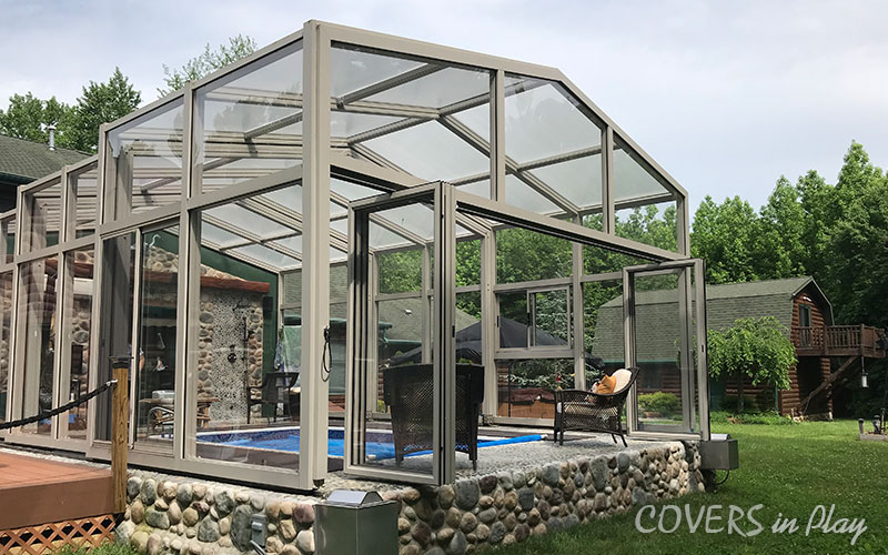 Exterior view of pool dome in Trenton, NJ, featuring an open bi-fold door.
